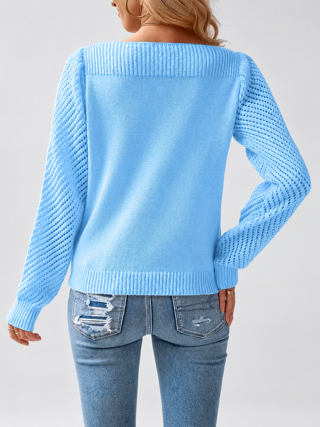Women's round neck knitted jumper in Blue, back view with open knit sleeves