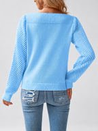 Women's round neck knitted jumper in Blue, back view with open knit sleeves