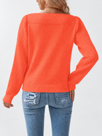 Women's round neck knitted jumper in Orange, back view with open knit sleeves