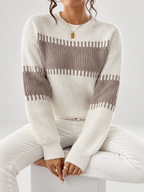Women's striped knitted jumper in Apricot – seated view