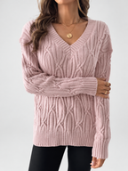 Women's V Neck Knit Jumper with Raised Cable Pattern and Drop Shoulders in Pink – Studio View 3