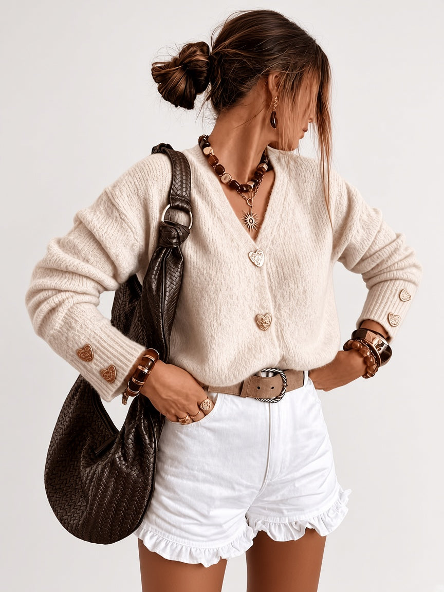 Women's V Neck Knitted Cardigan with Heart Shaped Button Front in Apricot – Front View
