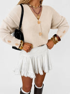 Women's V Neck Knitted Cardigan with Heart Shaped Button Front in Apricot – Front View