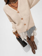 Women's V Neck Knitted Cardigan with Heart Shaped Button Front in Apricot – Detail