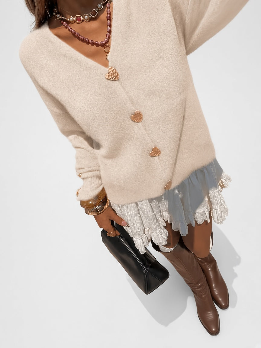 Women's V Neck Knitted Cardigan with Heart Shaped Button Front in Apricot – Detail