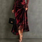 Women's burgundy velvet midi dress with lace sleeves and a ruched waist