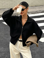 Women's Zip Up Knit Cardigan with Wide Collar and Ribbed Cuffs in Black – Three-Quarter View