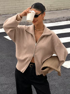 Women's Zip Up Knit Cardigan with Wide Collar and Ribbed Cuffs in Beige – Three-Quarter View