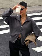 Women's Zip Up Knit Cardigan with Wide Collar and Ribbed Cuffs in Grey – Three-Quarter View